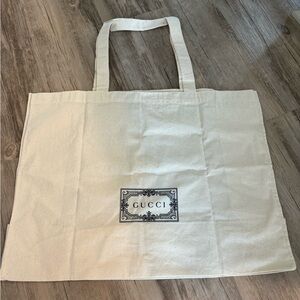 Gucci cloth tote bag.